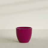 Wannsee Round Planter in Gloss Eggplant, 39"D × 34"H, shown empty