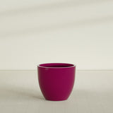 Wannsee Round Planter in Gloss Eggplant, 39"D × 34"H, shown empty