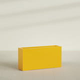 Hollywood Narrow Rectangular Planter in Gloss Saffron, 48"L × 12"D × 24"H, shown empty