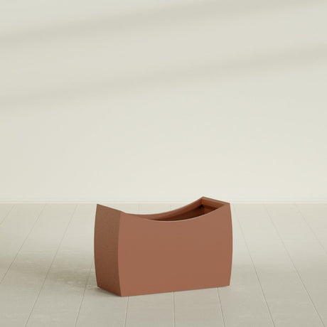 Seoul Curved Planter in Matte Terra Cotta, 36"L × 16"D × 24"H, shown empty