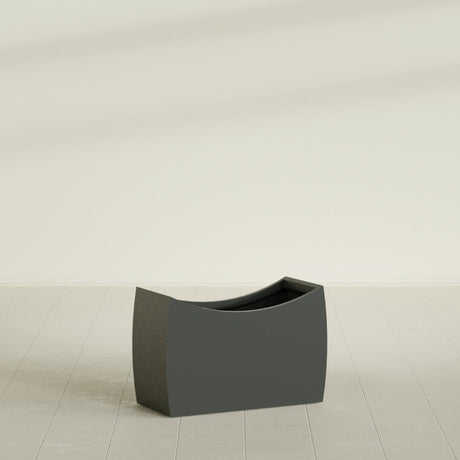 Seoul Curved Planter in Matte Charcoal, 36"L × 16"D × 24"H, shown empty