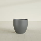 Wannsee Round Planter in Matte Gunmetal, 33"D × 29"H, shown empty