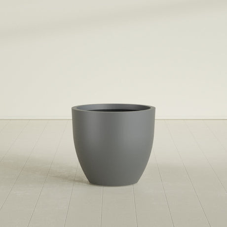 Wannsee Round Planter in Matte Gunmetal, 33"D × 29"H, shown empty