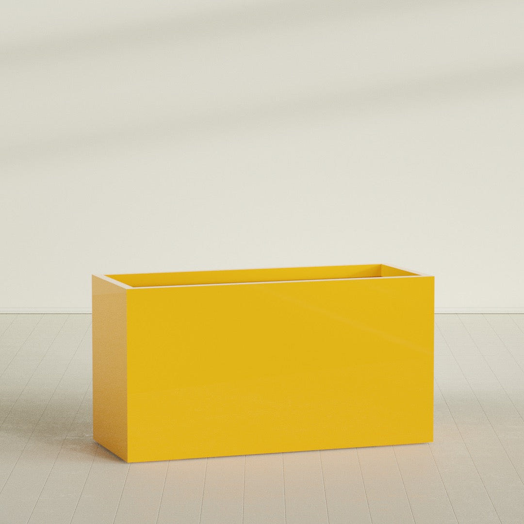 Brisbane Rectangular Planter in Gloss Saffron, 60"L × 24"D × 32"H, shown empty