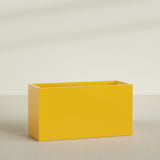 Brisbane Rectangular Planter in Gloss Saffron, 60"L × 24"D × 32"H, shown empty