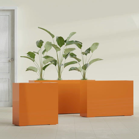 Milano Narrow Rectangular fiberglass planter in Gloss Tangerine, shown planted, in a sunlit interior