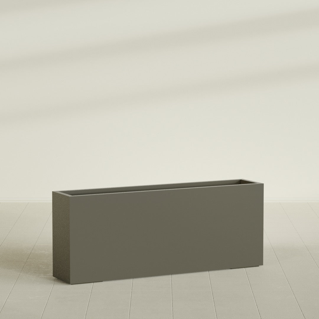 Hollywood Narrow Rectangular Planter in Matte Bronze, 60"L × 12"D × 24"H, shown empty