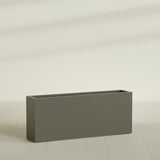 Hollywood Narrow Rectangular Planter in Matte Bronze, 60"L × 12"D × 24"H, shown empty