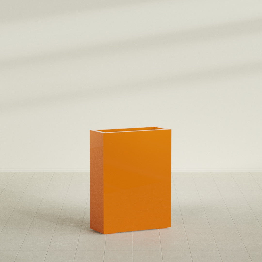 Amesbury Narrow Rectangular Planter in Gloss Tangerine, 24"L × 10"D × 32"H, shown empty
