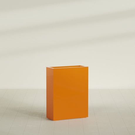 Amesbury Narrow Rectangular Planter in Gloss Tangerine, 24"L × 10"D × 32"H, shown empty
