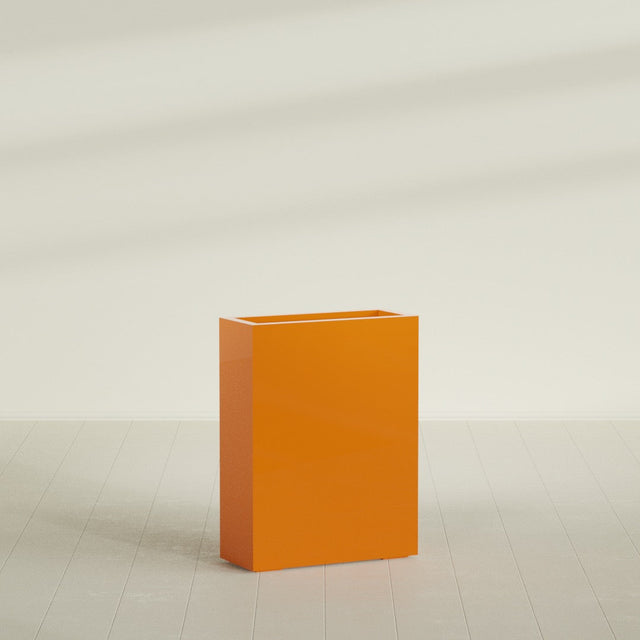 Amesbury Narrow Rectangular Planter in Gloss Tangerine, 24"L × 10"D × 32"H, shown empty