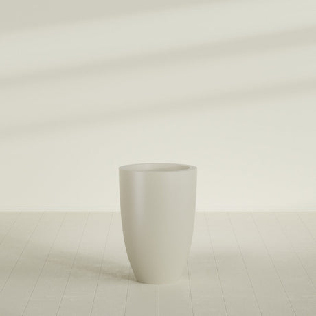 Brannan Tapered Round Planter in Satin Beige, 24"D × 35"H, shown empty
