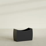Seoul Curved Planter in Matte Black, 36"L × 16"D × 24"H, shown empty