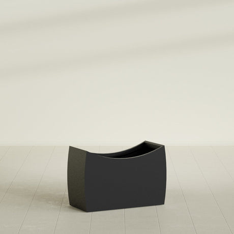 Seoul Curved Planter in Matte Black, 36"L × 16"D × 24"H, shown empty
