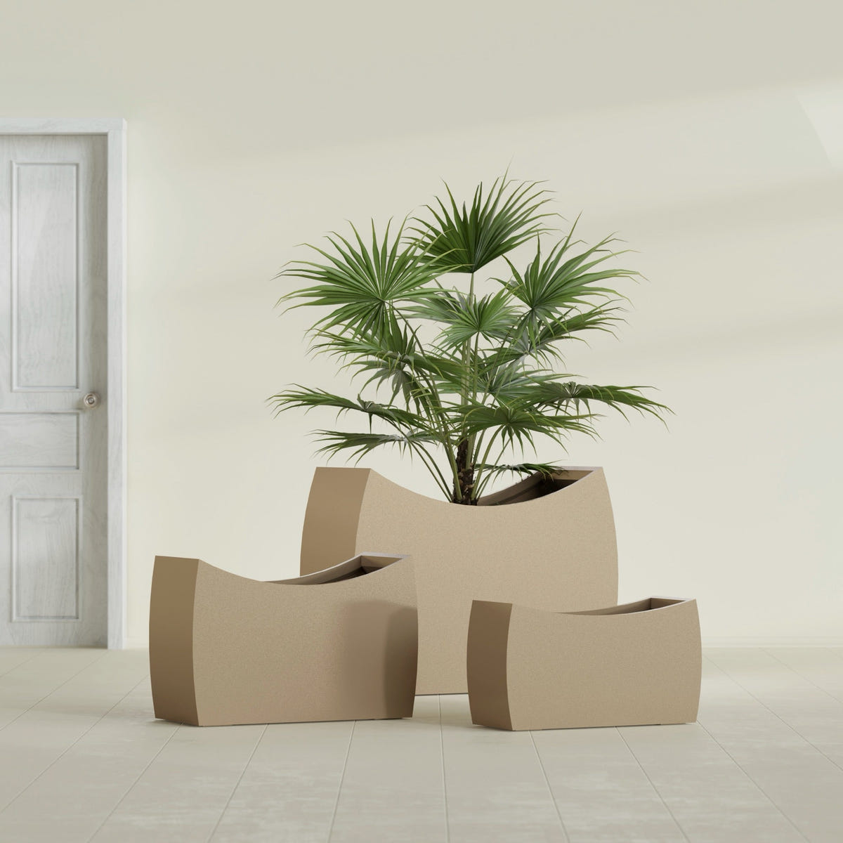 Seoul Curved fiberglass planter in Gloss Metallic Gold, size range, in a sunlit interior