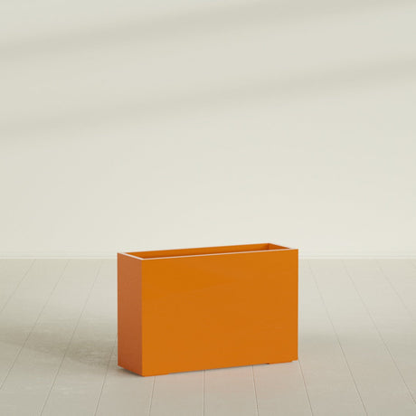 Potsdam Rectangular Planter in Gloss Tangerine, 48"L × 16"D × 32"H, shown empty