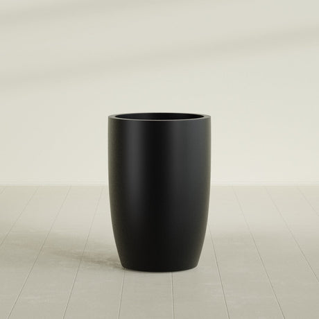 Lisbon tall round tapered fiberglass planter in Matte Black, 24 in diameter, 36 in high, shown empty