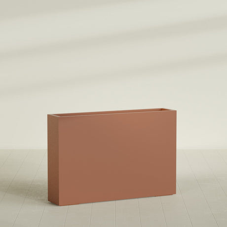 Amesbury Narrow Rectangular Planter in Matte Terra Cotta, 48"L × 10"D × 32"H, shown empty