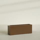 Miami Narrow Rectangular Planter in Metallic Bronze, 48"L × 12"D × 18"H, shown empty