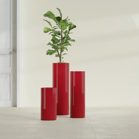 Corry Cylinder fiberglass planter in Gloss Red, size range, in a sunlit interior