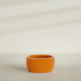 Casablanca Bowl Planter in Gloss Tangerine, 30"D × 15"H, shown empty