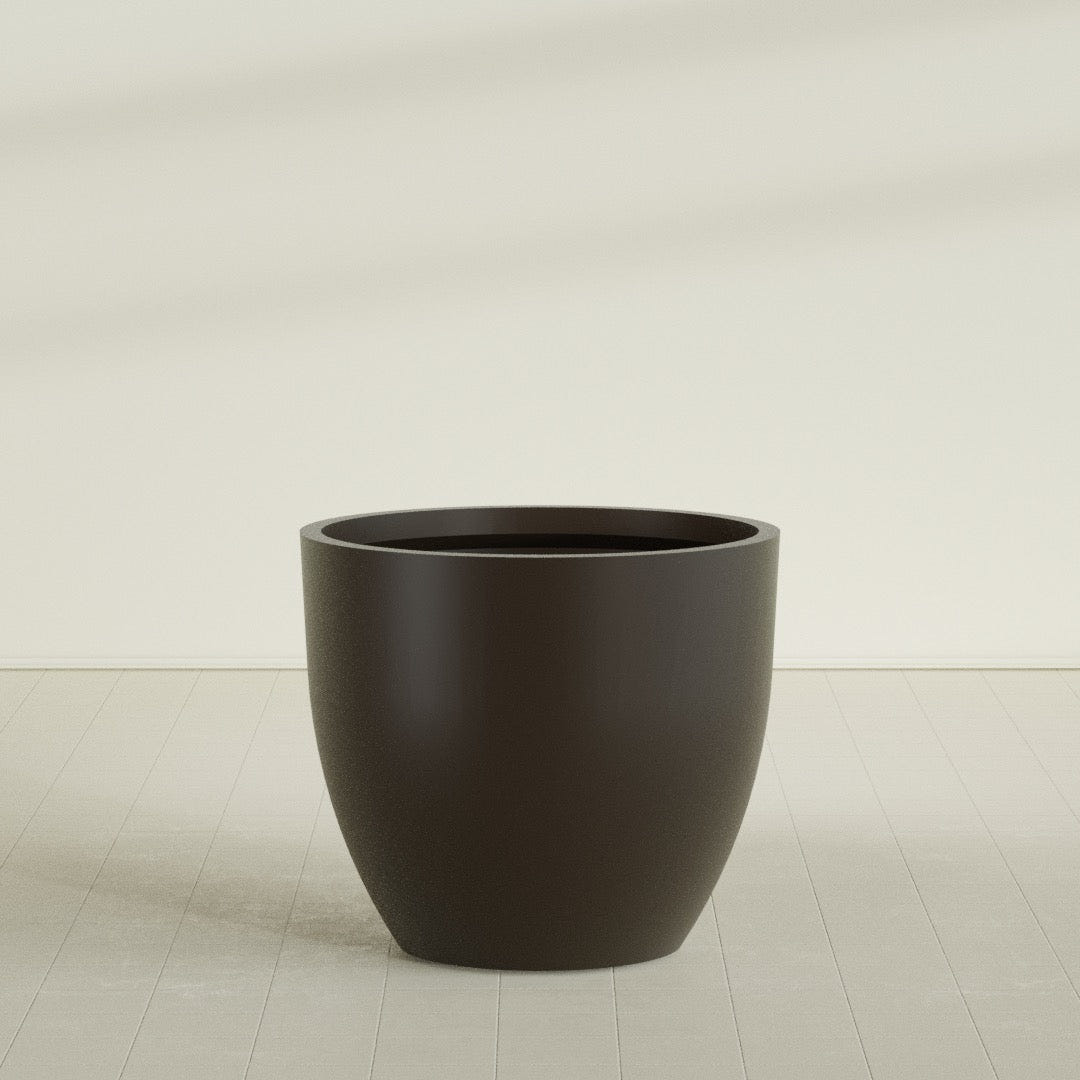 Wannsee Round Planter in Matte Dark Brown, 50"D × 44"H, shown empty