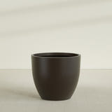 Wannsee Round Planter in Matte Dark Brown, 50"D × 44"H, shown empty