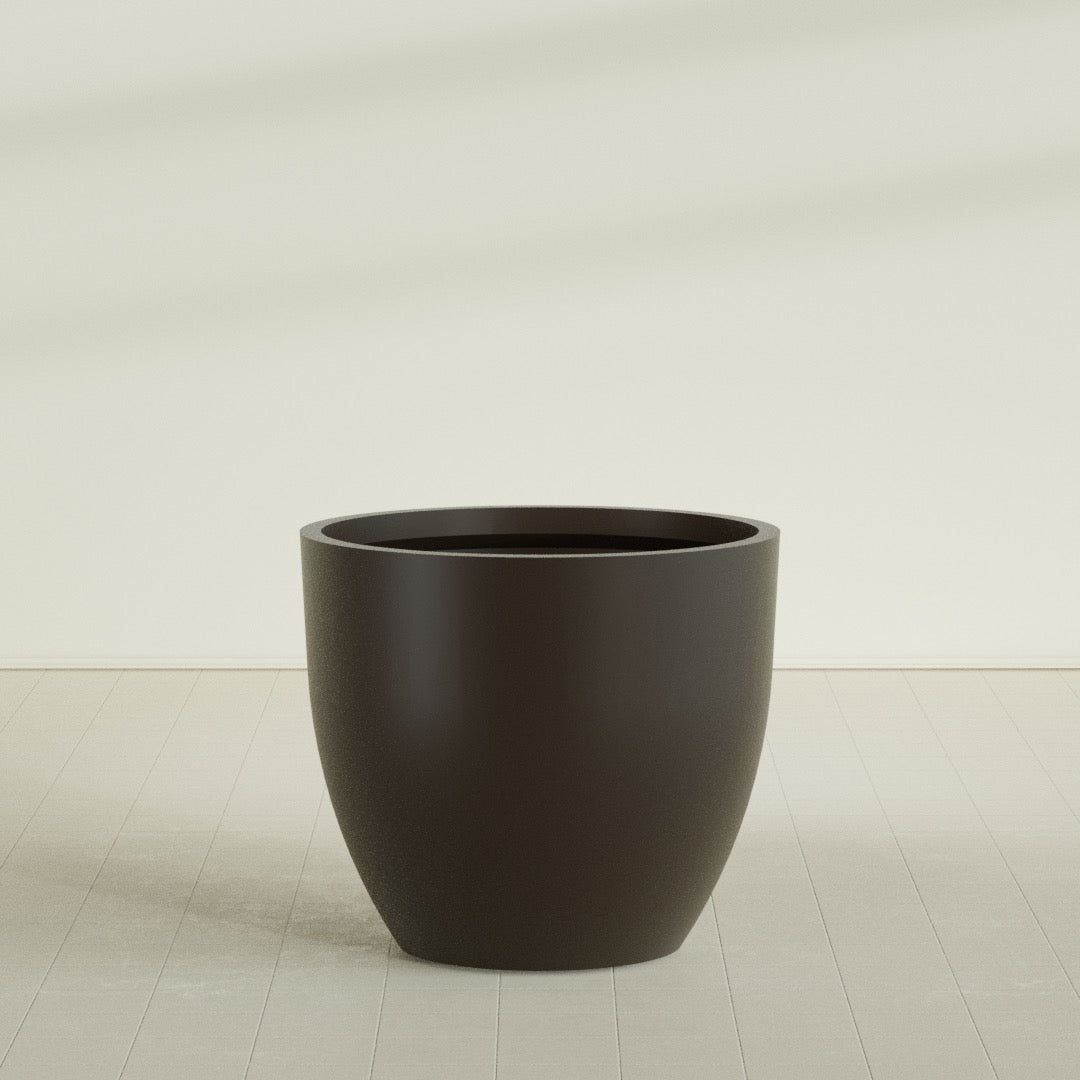 Wannsee Round Planter in Matte Dark Brown, 50"D × 44"H, shown empty