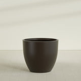 Wannsee Round Planter in Matte Dark Brown, 50"D × 44"H, shown empty