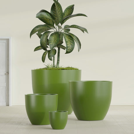 Wannsee Round fiberglass planter in Satin Green, size range, in a sunlit interior