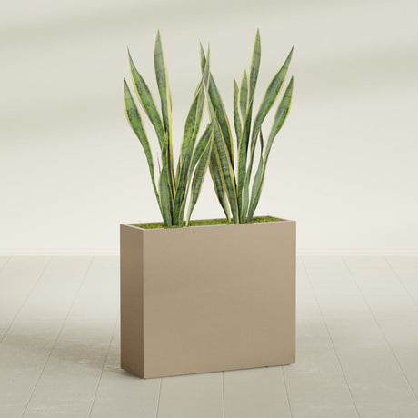Perth Rectangular fiberglass planter in Gloss Metallic Gold, shown planted, in a sunlit interior
