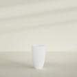 Brannan Tapered Round Planter in Matte Bright White, 18"D × 29"H, shown empty