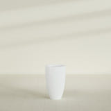 Brannan Tapered Round Planter in Matte Bright White, 18"D × 29"H, shown empty