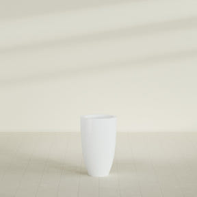 Brannan Tapered Round Planter in Matte Bright White, 18"D × 29"H, shown empty