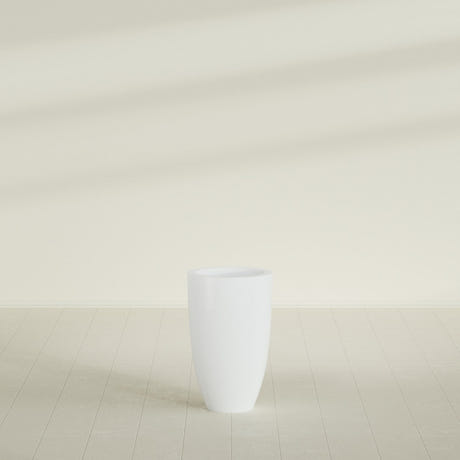 Brannan Tapered Round Planter in Matte Bright White, 18"D × 29"H, shown empty