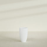 Brannan Tapered Round Planter in Matte Bright White, 18"D × 29"H, shown empty