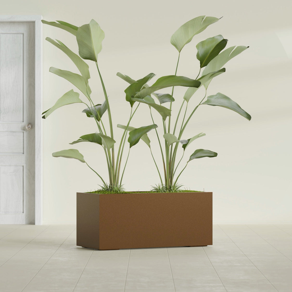 Badalona Rectangular fiberglass planter in Metallic Bronze, shown planted, in a sunlit interior