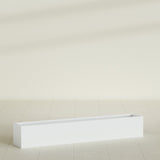 Monaco Rectangle Planter in Matte Bright White, 44"L, shown empty