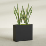 Perth Corner fiberglass planter in Matte Black, shown planted, in a sunlit interior