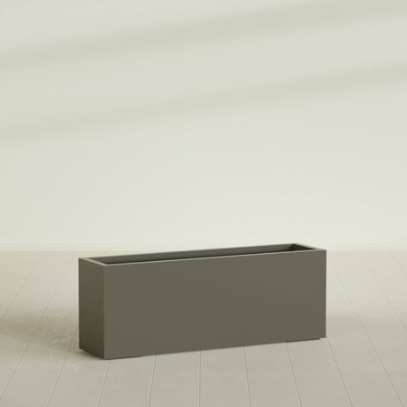 Miami Narrow Rectangular Planter in Matte Bronze, 48"L × 12"D × 18"H, shown empty
