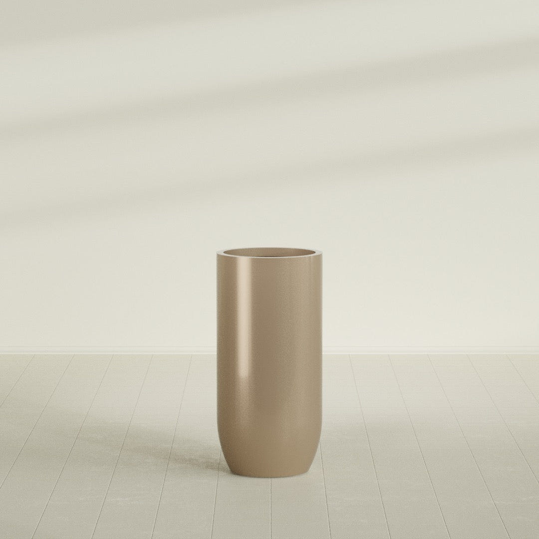 Saint Tropez Bullet Round Planter in Gloss Metallic Gold, 24"D × 50"H, shown empty