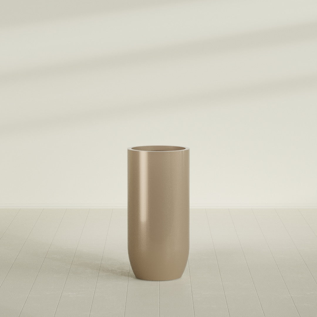 Saint Tropez Bullet Round Planter in Gloss Metallic Gold, 24"D × 50"H, shown empty