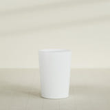 Tegel Round Tapered Planter in Matte Bright White, 22"D × 30"H, shown empty