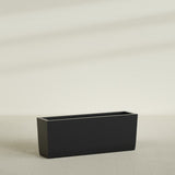 Panama Tapered Rectangular Planter in Matte Black, 48"L × 12"D × 18"H, shown empty