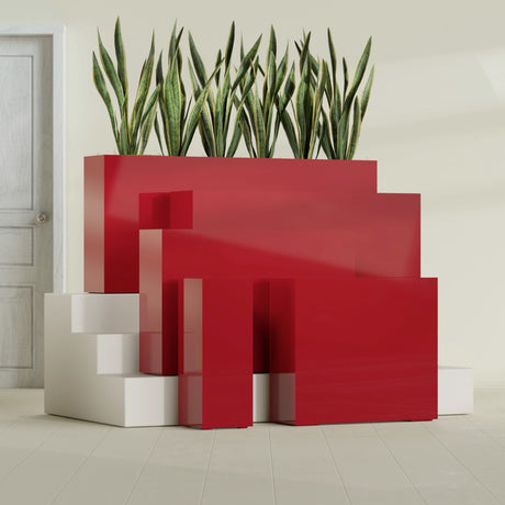 Delray Corner fiberglass planter in Gloss Red, size range, in a sunlit interior