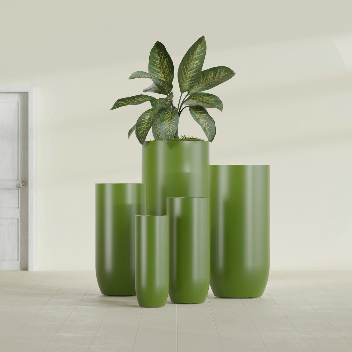 Saint Tropez Bullet Round fiberglass planter in Satin Green, size range, in a sunlit interior