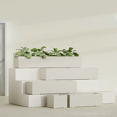 Cuba Low Rectangular fiberglass planter in Satin Beige, size range, in a sunlit interior
