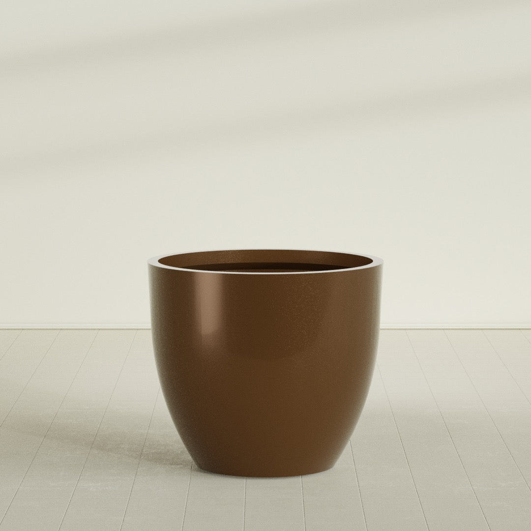 Wannsee Round Planter in Metallic Bronze, 50"D × 44"H, shown empty