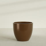 Wannsee Round Planter in Metallic Bronze, 50"D × 44"H, shown empty