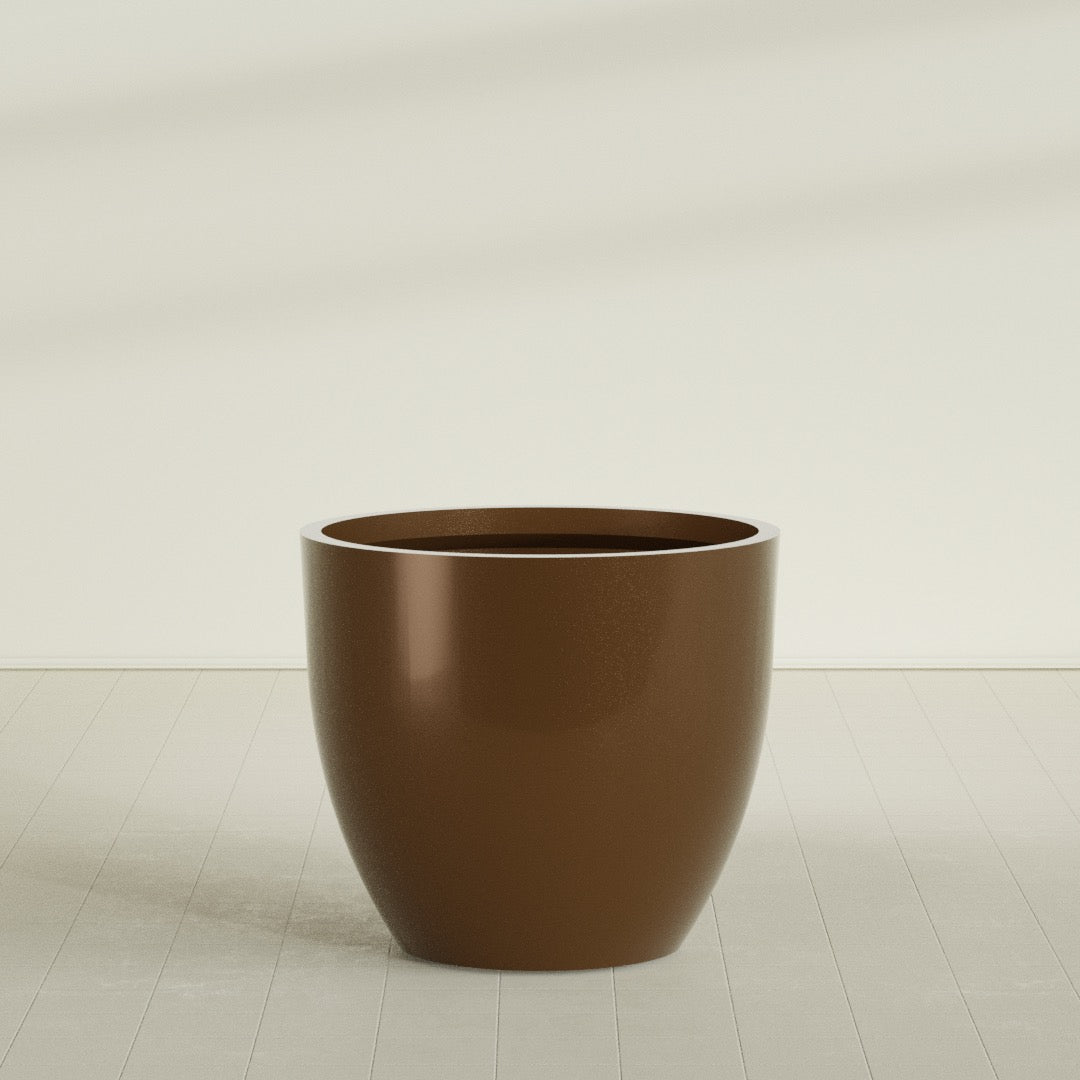 Wannsee Round Planter in Metallic Bronze, 50"D × 44"H, shown empty